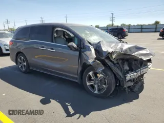 2020 Honda Odyssey Touring with VIN 5FNRL6H84LB032418, listed as a Copart auction lot 59118565 with Not provided miles and Salvage title. Bid and sale history available at DreamBid. Image 4.