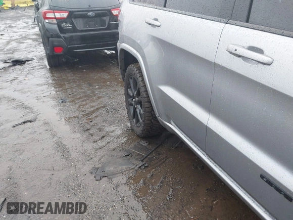 2021 Jeep Grand Cherokee Laredo E with VIN 1C4RJEAG6MC713910, listed as a IAAI auction lot 41041400 with 69,242 mi miles and . Bid and sale history available at DreamBid. Image 19.