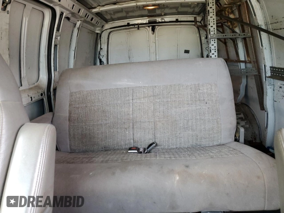 2006 Chevrolet Express Cargo z VIN 1GCHG35U761242721, wystawiony jako Copart lot #75036204 z przebiegiem 253 979 mil mil oraz Czysty tytuł • Clean title. Historia ofert i sprzedaży dostępna na DreamBid. Obrazek 10.