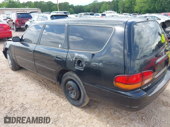 1996 Toyota Camry LE z VIN 4T1EF12K9TU117514, wystawiony jako IAAI lot #42241880 z przebiegiem 192 764 mil mil oraz . Historia ofert i sprzedaży dostępna na DreamBid. Obrazek 3.