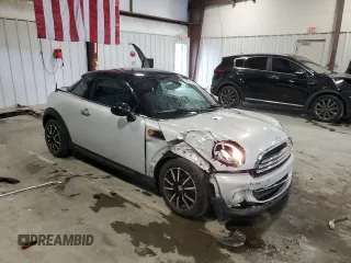 2013 MINI Cooper Coupe with VIN WMWSX1C50DT507354, listed as a Copart auction lot 48070765 with 98,830 mi miles and Salvage Title. Bid and sale history available at carsss.com. Image 4.