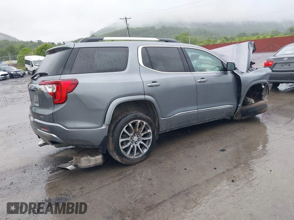 2021 GMC Acadia Denali z VIN 1GKKNXLS1MZ160927, wystawiony jako IAAI lot #42335027 z przebiegiem 60 014 mil mil oraz . Historia ofert i sprzedaży dostępna na DreamBid. Obrazek 4.