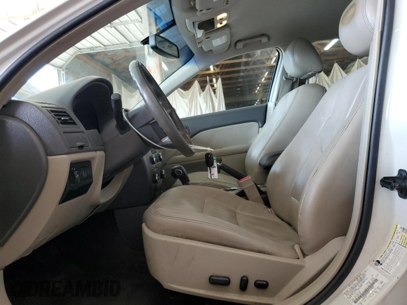 2012 Ford Fusion SEL z VIN 3FAHP0JG9CR164030, wystawiony jako Copart lot #62926985 z przebiegiem 136 043 mil mil oraz Szkoda całkowita • Salvage title. Historia ofert i sprzedaży dostępna na DreamBid. Obrazek 7.