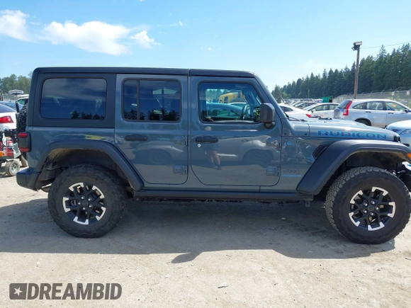 2024 Jeep Wrangler Rubicon X z VIN 1C4RJXR6XRW240316, wystawiony jako IAAI lot #42477607 z przebiegiem 41 375 mil mil oraz . Historia ofert i sprzedaży dostępna na DreamBid. Obrazek 13.