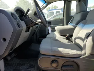 2005 Ford F-150 XL with VIN 1FTRF12W85NB33192, listed as a Copart auction lot 57240225 with 104,331 mi miles and Salvage title. Bid and sale history available at DreamBid. Image 7.