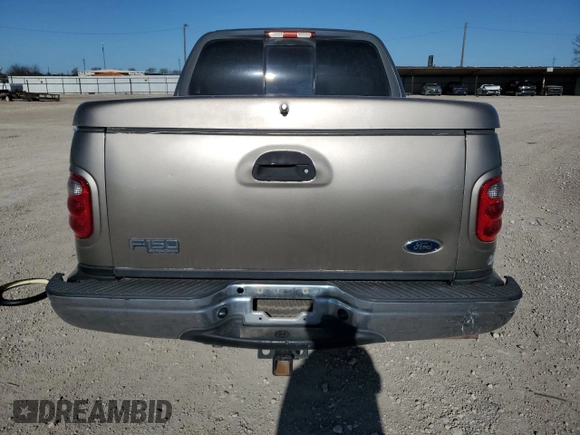 2003 Ford F-150 XLT with VIN 1FTRW07623KB92840, listed as a Copart auction lot 48603105 with 145,516 mi miles and Salvage Title. Bid and sale history available at carsss.com. Image 6.
