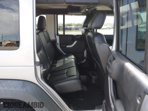 2015 Jeep Wrangler Unlimited Rubicon Hard Rock с VIN 1C4HJWFG6FL762537, выставлен на аукционе IAAI как лот 41792066 с пробегом 125 829 миль миль и . История ставок и продаж доступна на DreamBid. Изображение 8.