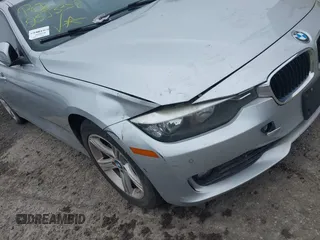 2015 BMW 3 Series 328i xDrive with VIN WBA3B5G57FNS12490, listed as a IAAI auction lot 41927689 with 999,999 mi miles. Bid and sale history available at carsss.com. Image 6.