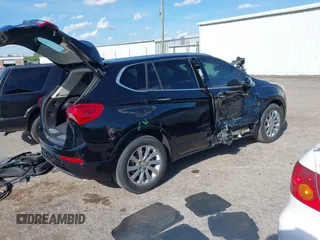 2020 Buick Envision Essence with VIN LRBFXCSA3LD209970, listed as a IAAI auction lot 42055134 with 59,854 mi miles and . Bid and sale history available at carsss.com. Image 4.