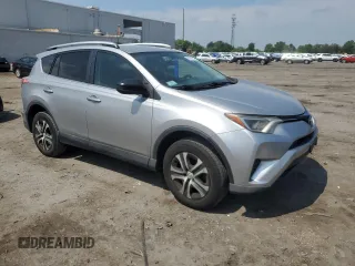 2016 Toyota RAV4 LE with VIN 2T3BFREV0GW424719, listed as a Copart auction lot 55050585 with 249,560 mi miles and Salvage Title. Bid and sale history available at DreamBid. Image 4.