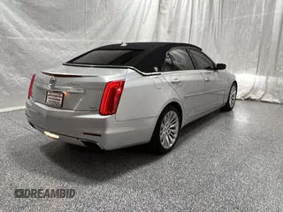 2014 Cadillac CTS Luxury AWD z VIN 1G6AX5S34E0124190, wystawiony jako Copart lot #57848785 z przebiegiem 63 259 mil mil oraz Czysty tytuł • Clean title. Historia ofert i sprzedaży dostępna na DreamBid. Obrazek 4.