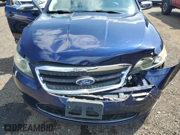 2011 Ford Taurus Limited with VIN 1FAHP2FW4BG135889, listed as a Copart auction lot 61493035 with 147,343 mi miles and Salvage title. Bid and sale history available at DreamBid. Image 11.