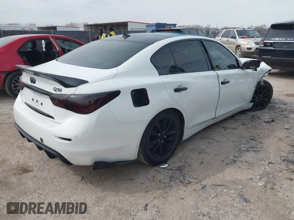 2015 Infiniti Q50 z VIN JN1BV7APXFM335981, wystawiony jako IAAI lot #41718555 z przebiegiem 83 918 mil mil oraz . Historia ofert i sprzedaży dostępna na DreamBid. Obrazek 4.