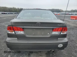 2000 Infiniti G20 Luxury z VIN JNKCP11A1YT304887, wystawiony jako Copart lot #74562724 z przebiegiem 202 140 mil mil oraz Czysty tytuł • Clean title. Historia ofert i sprzedaży dostępna na DreamBid. Obrazek 6.
