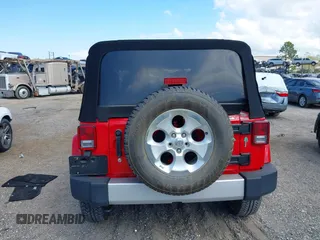 2014 Jeep Wrangler Sahara with VIN 1C4AJWBG0EL109773, listed as a IAAI auction lot 41678412 with 12,264 mi miles and . Bid and sale history available at DreamBid. Image 16.