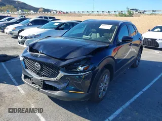2023 Mazda CX-30 S Select with VIN 3MVDMBBM8PM514475, listed as a IAAI auction lot 41664456 with 33,076 mi miles and . Bid and sale history available at DreamBid. Image 17.