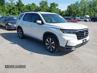 2023 Honda Pilot Elite z VIN 5FNYG1H82PB046438, wystawiony jako IAAI lot #42219595 z przebiegiem 32 509 mil mil oraz . Historia ofert i sprzedaży dostępna na DreamBid. Obrazek 1.