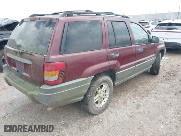 2003 Jeep Grand Cherokee Laredo with VIN 1J4GX48S83C576892, listed as a IAAI auction lot 42082865 with 212,157 mi miles. Bid and sale history available at carsss.com. Image 4.