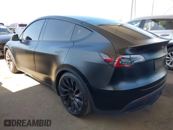 2022 Tesla Model Y Performance z VIN 7SAYGDEF0NF491586, wystawiony jako IAAI lot #42276747 z przebiegiem 117 203 mil mil oraz . Historia ofert i sprzedaży dostępna na DreamBid. Obrazek 3.
