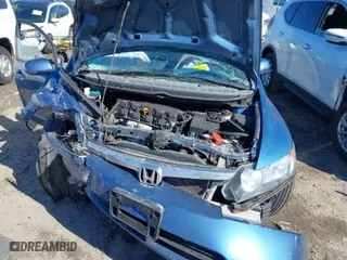 2008 Honda Civic Sdn LX with VIN 1HGFA16558L019168, listed as a IAAI auction lot 41700985 with 66,660 mi miles. Bid and sale history available at carsss.com. Image 6.