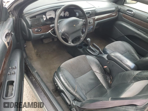2004 Chrysler Sebring Limited z VIN 1C3EL65R74N181053, wystawiony jako Copart lot #57616835 z przebiegiem 90 898 mil mil oraz Szkoda całkowita • Salvage title. Historia ofert i sprzedaży dostępna na DreamBid. Obrazek 8.