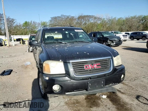 2004 GMC Envoy SLE with VIN 1GKDT13S042404250, listed as a Copart auction lot 52672455 with 230,610 mi miles and Salvage Title. Bid and sale history available at carsss.com. Image 12.