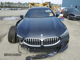 2020 BMW 8 Series 840i z VIN WBAGV4C0XLCD97822, wystawiony jako Copart lot #52265065 z przebiegiem Nie podano mil oraz Tytuł czysty. Historia ofert i sprzedaży dostępna na DreamBid. Obrazek 5.