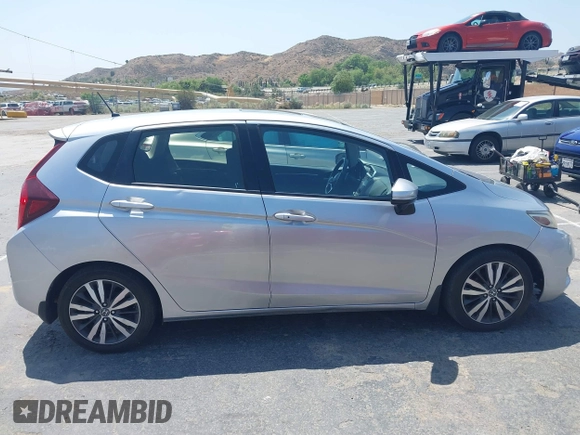 2016 Honda Fit EX with VIN JHMGK5H72GX028762, listed as a IAAI auction lot 42441874 with 98,778 mi miles and . Bid and sale history available at DreamBid. Image 13.