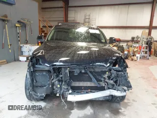 2014 Audi Q7 Premium Plus with VIN WA1LGAFE7ED003294, listed as a IAAI auction lot 42318454 with 113,719 mi miles and . Bid and sale history available at DreamBid. Image 13.