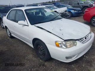 2002 Toyota Corolla CE with VIN 2T1BR12EX2C545922, listed as a IAAI auction lot 41672586 with 212,557 mi miles and . Bid and sale history available at DreamBid. Image 1.