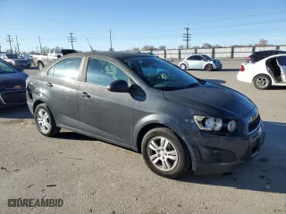 2014 Chevrolet Sonic LT with VIN 1G1JC5SG4E4159776, listed as a Copart auction lot 50043465 with 98,245 mi miles and Salvage Title. Bid and sale history available at carsss.com. Image 4.
