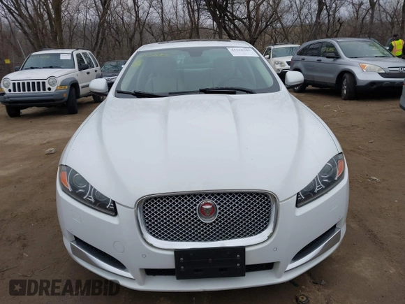 2015 Jaguar XF V6 Portfolio with VIN SAJWJ0FF2F8U59934, listed as a IAAI auction lot 41558305 with 120,219 mi miles. Bid and sale history available at carsss.com. Image 12.