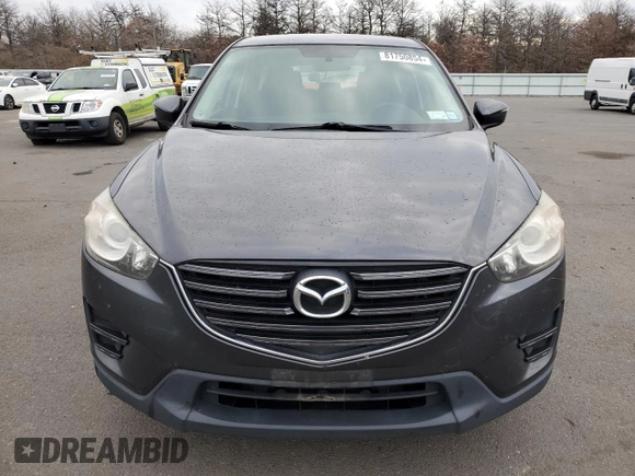 2016 Mazda CX-5 Sport with VIN JM3KE2BE8G0761648, listed as a Copart auction lot 81750854 with 191,384 mi miles and Clean Title. Bid and sale history available at DreamBid. Image 5.