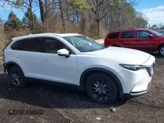 2016 Mazda CX-9 Touring with VIN JM3TCBCY4G0100511, listed as a IAAI auction lot 41811185 with 112,932 mi miles. Bid and sale history available at carsss.com. Image 13.