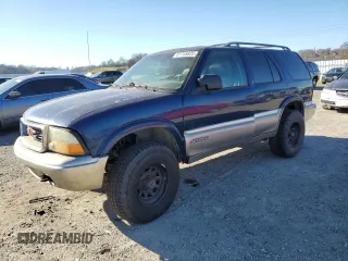 2000 GMC Jimmy SLE Convenience with VIN 1GKDT13W8Y2330794, listed as a Copart auction lot 87745825 with 168,128 mi miles and Clean Title. Bid and sale history available at carsss.com. Image 1.