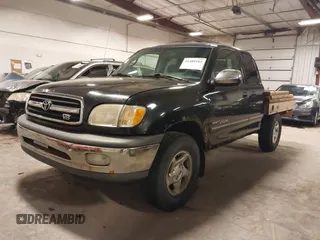 2000 Toyota Tundra SR5 with VIN 5TBRT341XYS066351, listed as a IAAI auction lot 41485162 with 218,512 mi miles and . Bid and sale history available at DreamBid. Image 2.
