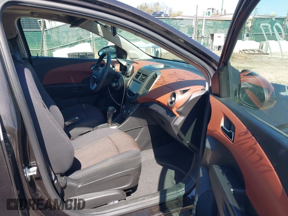 2014 Chevrolet Sonic LT with VIN 1G1JC6SB6E4210561, listed as a IAAI auction lot 42073197 with 100,945 mi miles. Bid and sale history available at carsss.com. Image 5.