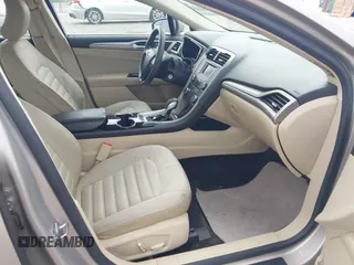 2015 Ford Fusion SE Hybrid с VIN 3FA6P0LU6FR199722, выставлен на аукционе IAAI как лот 42447523 с пробегом 151 769 миль миль и . История ставок и продаж доступна на DreamBid. Изображение 5.