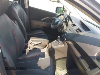 2012 Mazda 5 Grand Touring with VIN JM1CW2DL6C0138979, listed as a IAAI auction lot 41936188 with 57,963 mi miles and . Bid and sale history available at carsss.com. Image 5.
