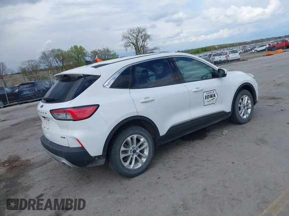 2020 Ford Escape SE with VIN 1FMCU9G67LUC31633, listed as a IAAI auction lot 42173290 with 136,937 mi miles and . Bid and sale history available at DreamBid. Image 4.
