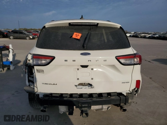 2022 Ford Escape Titanium with VIN 1FMCU9J91NUB93886, listed as a Copart auction lot 82764154 with Not provided miles and Clean title. Bid and sale history available at DreamBid. Image 6.