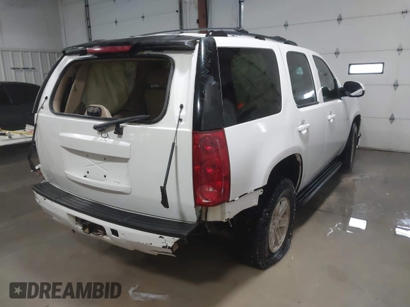 2007 GMC Yukon SLT with VIN 1GKFK130X7R203221, listed as a IAAI auction lot 41583409 with 254,586 mi miles. Bid and sale history available at carsss.com. Image 4.