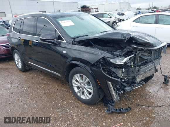 2023 Cadillac XT6 FWD Luxury with VIN 1GYKPAR44PZ114020, listed as a IAAI auction lot 41669115 with 110,305 mi miles and . Bid and sale history available at DreamBid. Image 1.