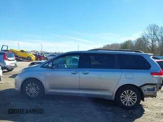2012 Toyota Sienna XLE AAS z VIN 5TDYK3DC7CS277944, wystawiony jako IAAI lot #41311855 z przebiegiem 224 239 mil mil oraz . Historia ofert i sprzedaży dostępna na DreamBid. Obrazek 15.