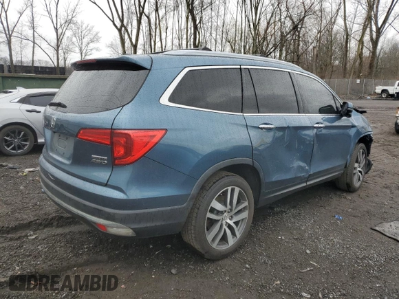 2016 Honda Pilot Touring with VIN 5FNYF6H91GB022219, listed as a Copart auction lot 52796985 with 142,014 mi miles and Salvage Title. Bid and sale history available at carsss.com. Image 3.