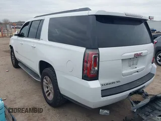 2015 GMC Yukon XL SLT with VIN 1GKS1HKCXFR652337, listed as a IAAI auction lot 41330287 with 139,268 mi miles. Bid and sale history available at carsss.com. Image 3.