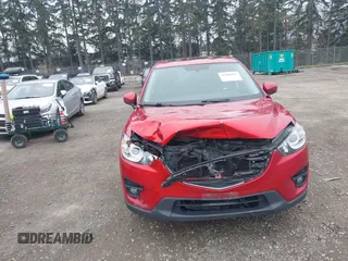 2016 Mazda CX-5 Touring with VIN JM3KE4CY2G0894930, listed as a IAAI auction lot 41906809 with 123,125 mi miles. Bid and sale history available at carsss.com. Image 12.