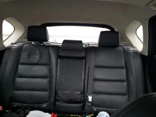 2016 Mazda CX-5 Grand Touring z VIN JM3KE2DY9G0687261, wystawiony jako Copart lot #52865415 z przebiegiem Nie podano mil oraz Szkoda całkowita • Salvage title. Historia ofert i sprzedaży dostępna na DreamBid. Obrazek 10.