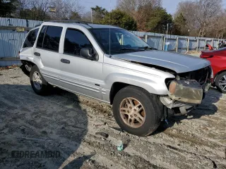 2004 Jeep Grand Cherokee Laredo z VIN 1J4GW48S84C200617, wystawiony jako Copart lot #51732045 z przebiegiem 171 452 mil mil oraz Nie do naprawy • Non repairable. Historia ofert i sprzedaży dostępna na DreamBid. Obrazek 4.