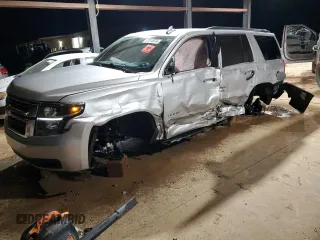 2020 Chevrolet Tahoe LS with VIN 1GNSCAKCXLR166921, listed as a Copart auction lot 87012074 with 59,383 mi miles and Salvage title. Bid and sale history available at DreamBid. Image 1.
